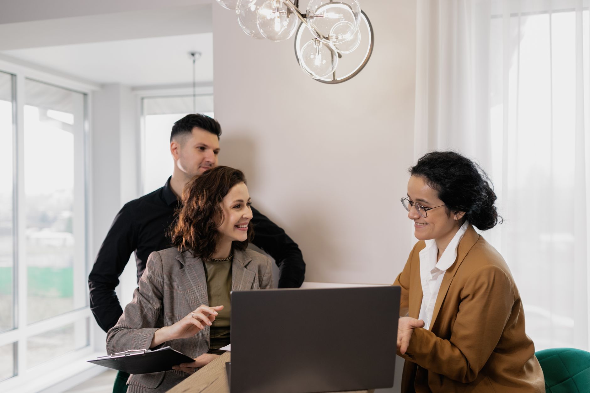 a man and a woman talking to an agent